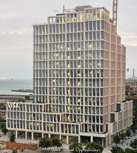 VISA Global Headquarters building at 300 Toni Stone Xing at Mission Rock in San Francisco, California - © 2024 David Oppenheimer - Performance Impressions photography archives - https://performanceimpressions.com VISA, VISA Global Headquarters, VISA Global HQ, HQ, headquarters, building, architecture, 300 Toni Stone Xing, Mission Rock, Mission Bay, China Basin, Pier 48, San Francisco, Bay Area, V stock, Henning Larsen, Visa Building, credit, investing, credit cards, payment services, banking, vertical, color, David Oppenheimer, United States, 1-13985601741,