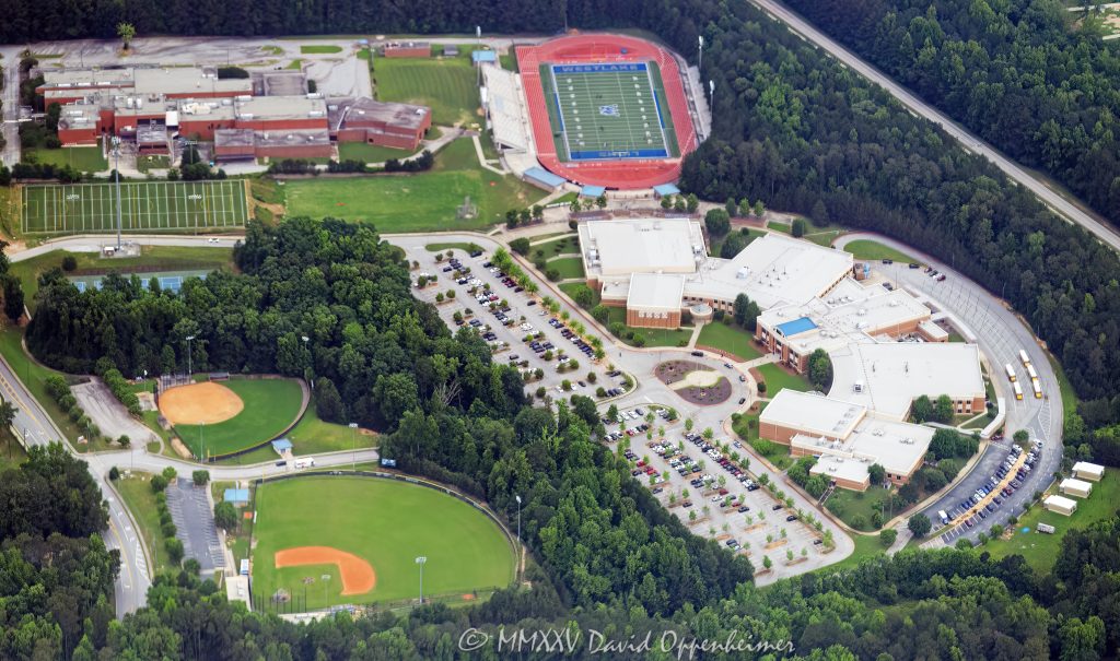 Westlake High School Campus in Atlanta Georgia Aerial View Westlake High School campus in the South Fulton area at 2400 Union Rd SW in Atlanta, Georgia aerial view – © 2025 David Oppenheimer – Performance Impressions aerial photography archives – https://performanceimpressions.com Westlake High School, Westlake, Westlake High School aerial, aerial, aerial view, campus, high school, Fulton County, Fulton County Schools, South Fulton, 2400 Union Rd SW, Atlanta, Georgia, school, Fulton County School System, Georgia Department of Education, students, learn, education, diploma, graduate, four-year, public, 110258, 30331, Southern Association of Colleges and Schools, magnet program, Gardner Spencer Smith Tench & Jarbeau, H.J. Russell & Company, sports, softball, fields, softball field, Westlake High School Softball Field, stadium, Lion Stadium, Lions, baseball, baseball field, Westlake High School Baseball Field, football, buildings, architecture, layout, view, roof, USA. horizontal, color, 1-14993092111