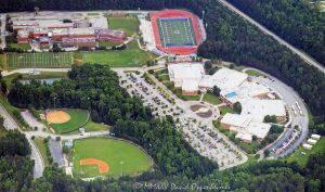 Westlake High School campus in the South Fulton area at 2400 Union Rd SW in Atlanta, Georgia aerial view – © 2025 David Oppenheimer – Performance Impressions aerial photography archives – https://performanceimpressions.com Westlake High School, Westlake, Westlake High School aerial, aerial, aerial view, campus, high school, Fulton County, Fulton County Schools, South Fulton, 2400 Union Rd SW, Atlanta, Georgia, school, Fulton County School System, Georgia Department of Education, students, learn, education, diploma, graduate, four-year, public, 110258, 30331, Southern Association of Colleges and Schools, magnet program, Gardner Spencer Smith Tench & Jarbeau, H.J. Russell & Company, sports, softball, fields, softball field, Westlake High School Softball Field, stadium, Lion Stadium, Lions, baseball, baseball field, Westlake High School Baseball Field, football, buildings, architecture, layout, view, roof, USA. horizontal, color, 1-14993092111