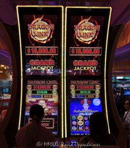 Dragon Link slot machines by Aristocrat Gaming at Wynn Las Vegas Resort and Casino in Las Vegas, Nevada - © 2025 David Oppenheimer - Performance Impressions casino photography archives - https://performanceimpressions.com Dragon Link, Aristocrat Gaming, Aristocrat, Dragon Cash, Dragon Link slots, slot machines, slots, Asian-themed, Wynn Casino, casino, gaming, play, betting, odds, win, gambling, wager, bet, luck, gamble, 3355 S Las Vegas Blvd, 89109, Wynn, Encore, Encore Las Vegas, Encore Resort, Encore Casino, Encore Vegas, Encore at Wynn, Wynn Las Vegas, Wynn Vegas, Wynn Resort, Wynn Resorts, 3131 Las Vegas Blvd S, 89109, hotel, resort, WYNN, WYNN stock, five star, five-star, luxury, Las Vegas, Vegas, Las Vegas Strip, casino floor, entertainment, luxury gaming, Nevada casino, vacation, escape, dream, art, fine art, artwork, Nevada, Nevada photography, colorful, wall art, United States, vertical, color, 1-14993092111