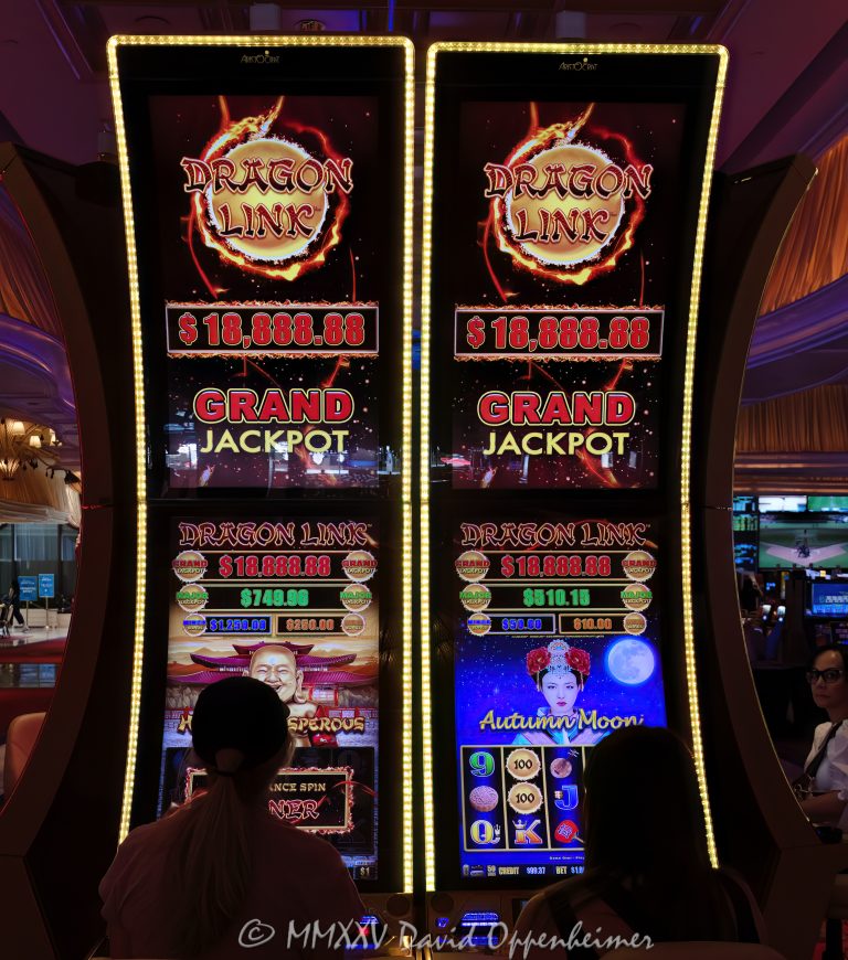 Dragon Link slot machines by Aristocrat Gaming at Wynn Las Vegas Resort and Casino in Las Vegas, Nevada - © 2025 David Oppenheimer - Performance Impressions casino photography archives - https://performanceimpressions.com Dragon Link, Aristocrat Gaming, Aristocrat, Dragon Cash, Dragon Link slots, slot machines, slots, Asian-themed, Wynn Casino, casino, gaming, play, betting, odds, win, gambling, wager, bet, luck, gamble, 3355 S Las Vegas Blvd, 89109, Wynn, Encore, Encore Las Vegas, Encore Resort, Encore Casino, Encore Vegas, Encore at Wynn, Wynn Las Vegas, Wynn Vegas, Wynn Resort, Wynn Resorts, 3131 Las Vegas Blvd S, 89109, hotel, resort, WYNN, WYNN stock, five star, five-star, luxury, Las Vegas, Vegas, Las Vegas Strip, casino floor, entertainment, luxury gaming, Nevada casino, vacation, escape, dream, art, fine art, artwork, Nevada, Nevada photography, colorful, wall art, United States, vertical, color, 1-14993092111