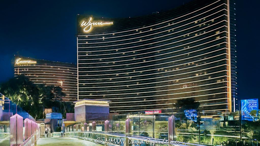 Wynn and Encore Las Vegas Resort and Casino at Night Wynn and Encore Las Vegas resort and casino lights at night in Las Vegas, Nevada - © 2025 David Oppenheimer - Performance Impressions photography archives - https://performanceimpressions.com Wynn, Encore, Encore Las Vegas, Encore Resort, Encore Casino, Encore Vegas, Encore at Wynn, Wynn Las Vegas, Wynn Vegas, Wynn Resort, Wynn Casino, Wynn Resorts, 3131 Las Vegas Blvd S, 89109, hotel, casino, resort, building, architecture, shops, shopping, bridge, night, lights, city lights, WYNN, WYNN stock, five star, luxury, Louis Vuitton, CHANEL, Dior, Cartier, Fashion Show Mall Bridge to Wynn, Fashion Show Mall Bridge, Las Vegas, Vegas, Las Vegas at night, Las Vegas city lights, Las Vegas Strip, Las Vegas Strip architecture, Las Vegas night photography, night photo, nighttime, cityscape, urban photography, mall, Fashion Show, vacation, escape, dream, art, fine art, artwork, painting, resort architecture, casino lights, neon lights, modern architecture, urban, casinos, facade, urban design, design, skyline, Nevada, Nevada photography, colorful, United States, horizontal, color, 1-14977862771