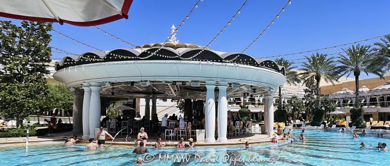 Poolside bar at The Pool at the Wynn Las Vegas Resort and Casino in Las Vegas, Nevada – © 2025 David Oppenheimer – Performance Impressions Travel Photography Archives – https://performanceimpressions.com The Pool, Wynn Pool, pool, swimming, swimming pool, resort pool, poolside, pool deck, poolside bar, bar, cocktails, drinks, mixology, lounge, cabanas, daybeds, umbrellas, palm trees, leisure, relaxation, summer, vacation, entertainment, XS, XS Night Swim, Wynn XS, XS pool party, XS Las Vegas, daytime, resort, casino, hotel, luxury resort, luxury hotel, Las Vegas casino, Las Vegas resort, hospitality, five star, fine art photography, resort photography, travel photography, resort design, architecture, landscape architecture, design, modern, contemporary, luxury lifestyle, reflections, water reflections, turquoise, blue, elegant, opulent, Wynn Las Vegas, Wynn, Wynn Resort, Wynn Casino, Wynn Resorts, Encore Las Vegas, Encore Resort, Encore Casino, Encore at Wynn, Las Vegas, Vegas, Nevada, Las Vegas Strip, 3131 Las Vegas Blvd S, 89109, United States, USA, horizontal, color, 1-14993092112